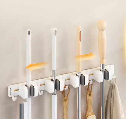 حامل ممسحة ومكانس مثبت على الحائط