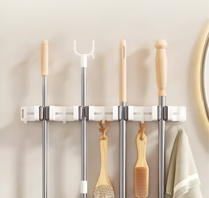 حامل ممسحة ومكانس مثبت على الحائط